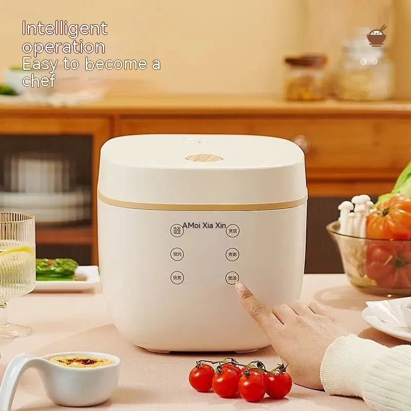 White 3L rice cooker with black inner pot and included accessories
