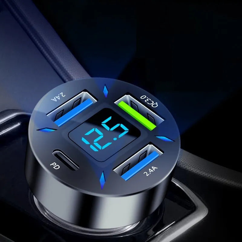 Four-port USB car charger with LED digital voltage display showing 12V.