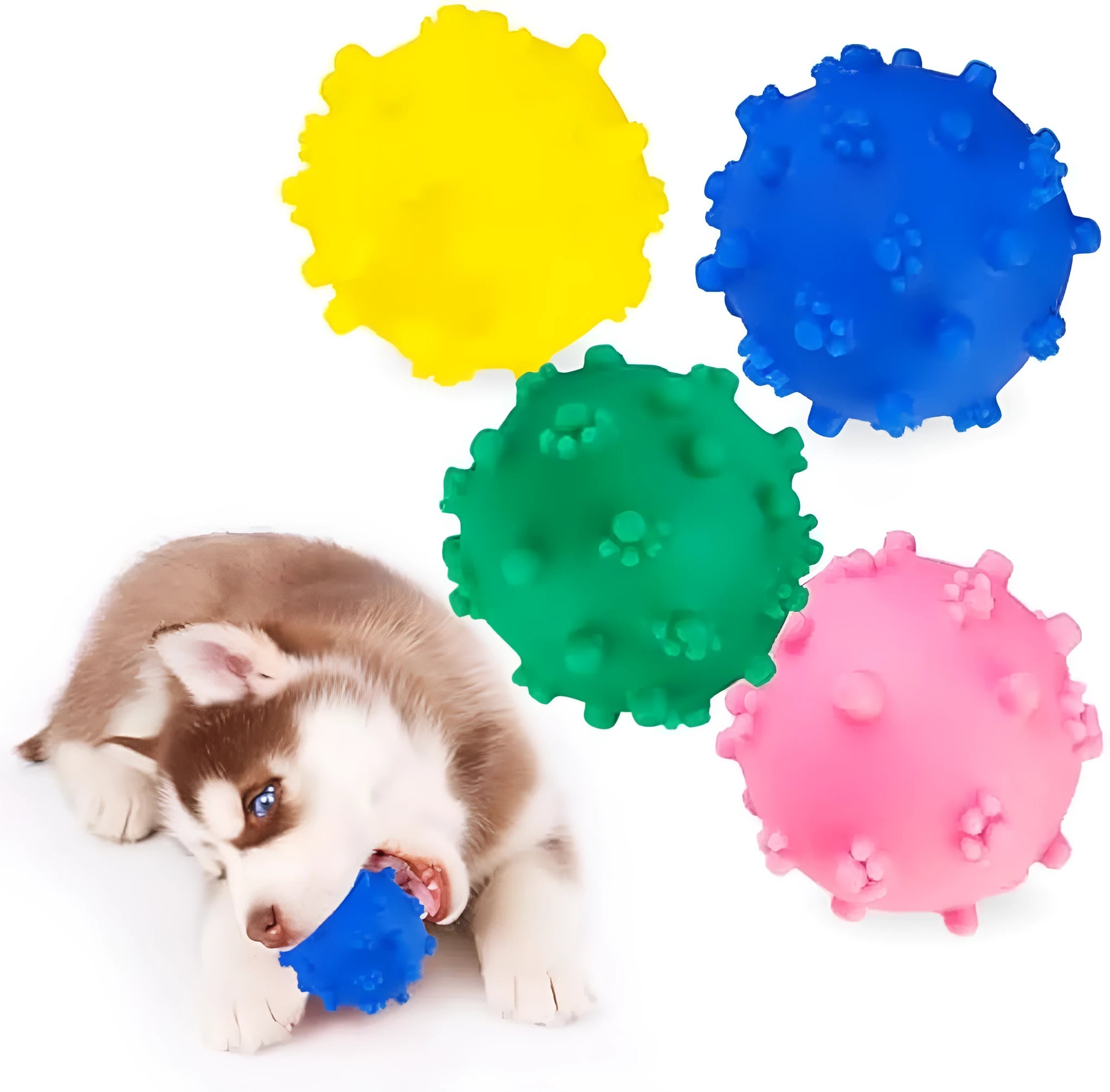 Bright blue, green, pink and yellow spiked squeaky dog balls for small breeds on a grass background.