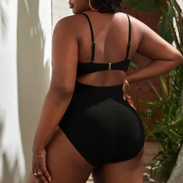 Plus size women's black slimming one-piece swimsuit with triangle sling and sleeveless design, sizes S-5XL