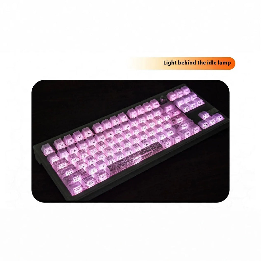 Transparent mechanical keyboard keycaps with white double-stitched lettering on clear PC material