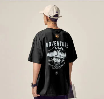 Men's black plus size loose fit short-sleeved t-shirt on a hanger