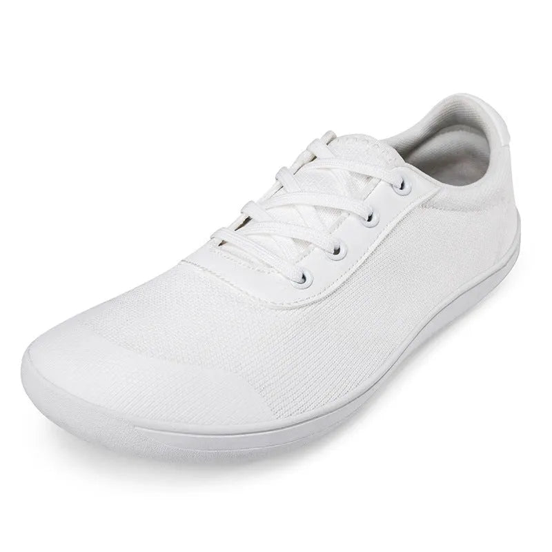 Men's low-top training shoe in a solid colour with a mesh upper and ribbed outsole, shown in a larger size.