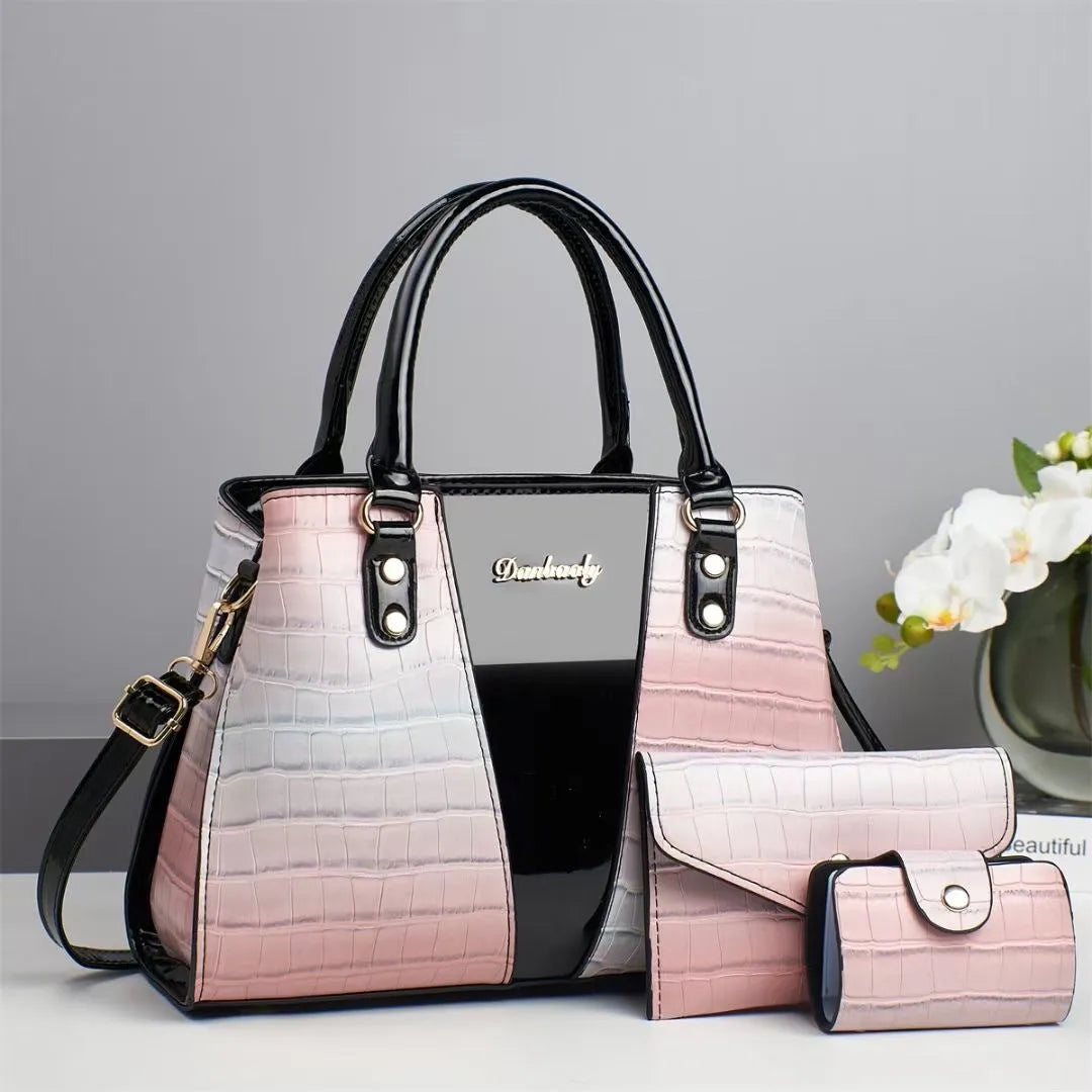 Women's crocodile-stitching three-piece shoulder bag set in PU leather showing main bag and two smaller pouches