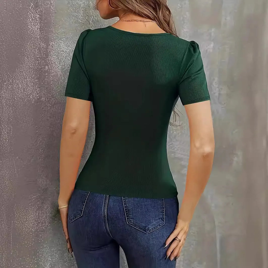 Women's wine red knitted slim fit short sleeve pullover top on a hanger.