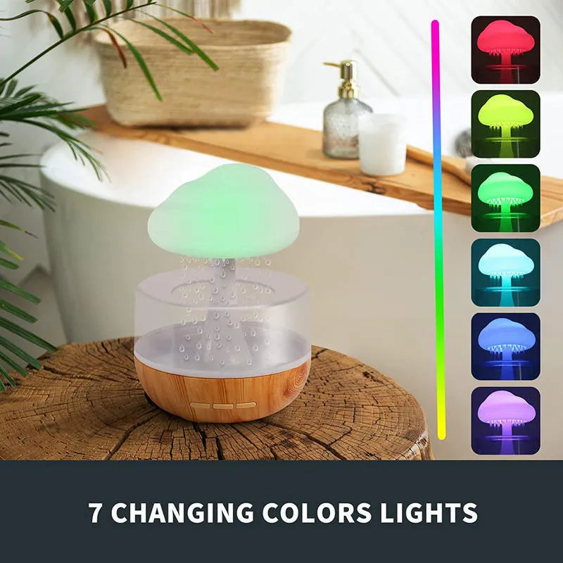 Desk humidifier with raining cloud design, essential oil diffuser, and mushroom lamp night light