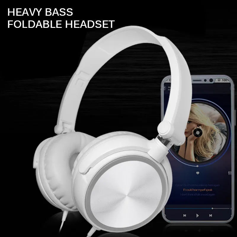 Red folding over-ear wired headphones with adjustable headband and 3.5mm plug on a table