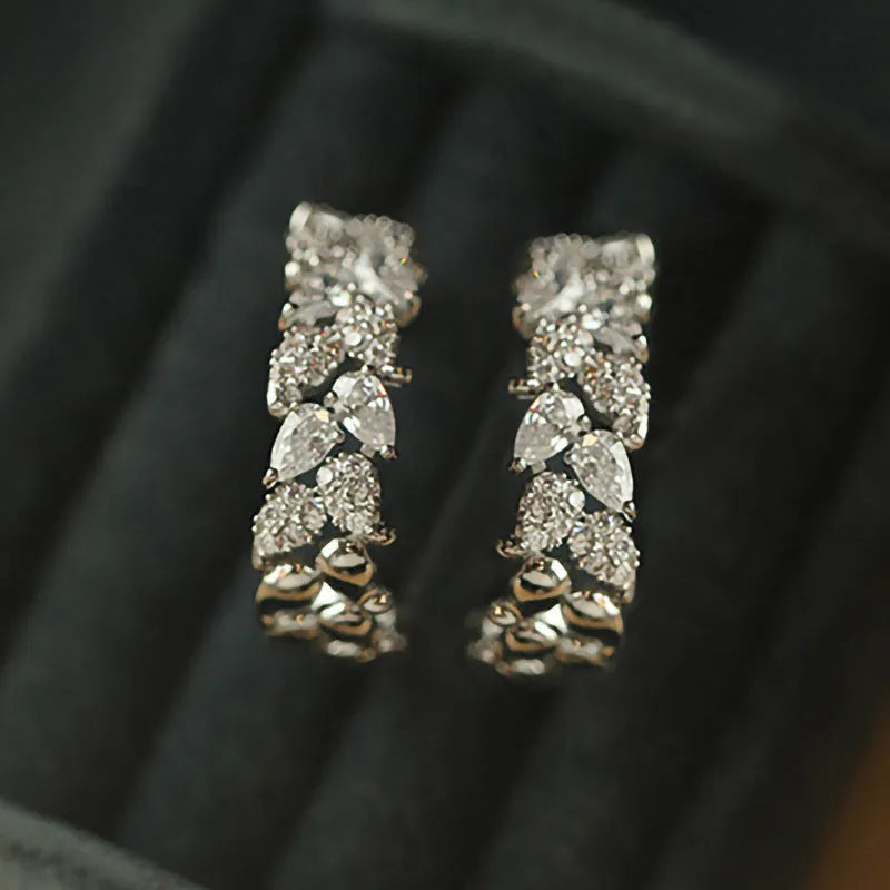 Women's copper earrings in white gold colour with inlaid zircon and wheat leaf design