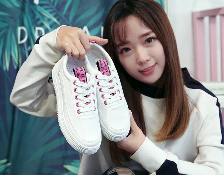 Women's breathable canvas sneaker in microfiber leather with rubber outsole, shown in black, green, or pink