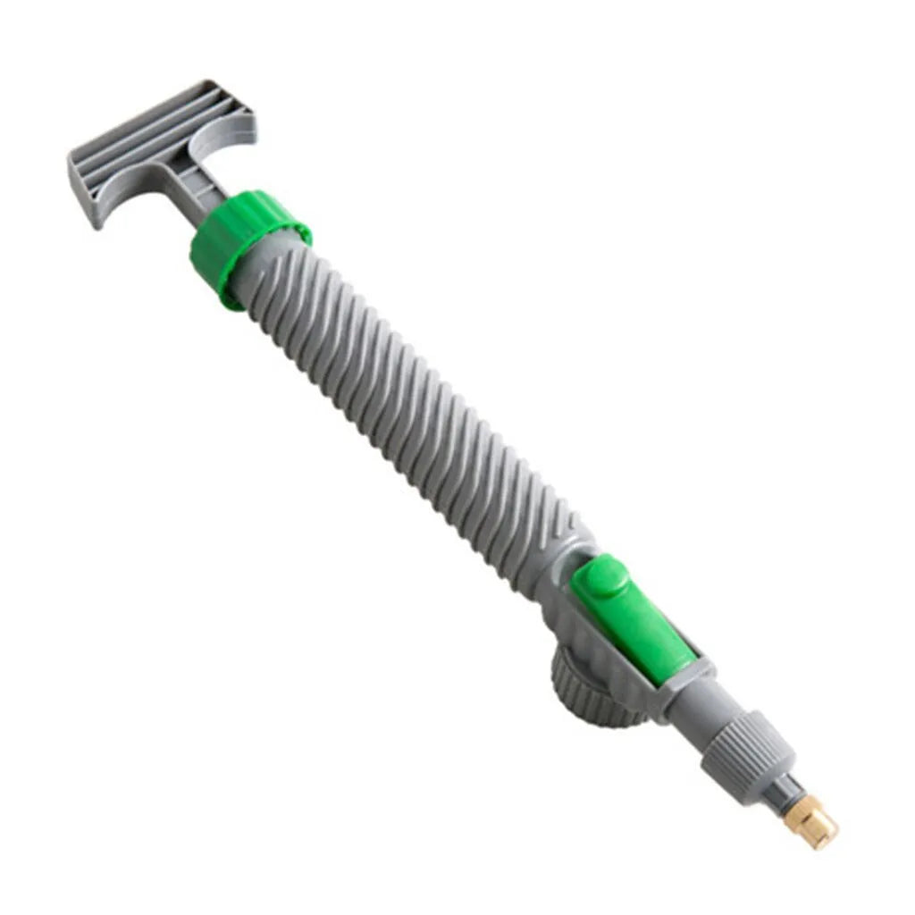 Grey watering sprayer nozzle attached to plastic bottle with 30cm connecting tube for garden watering