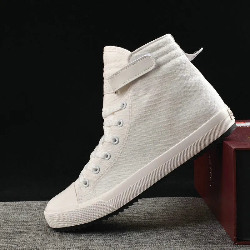 Velcro student canvas shoes high top with canvas upper, rubber vulcanised sole, round toe, and flat heel in black, grey or red and white.