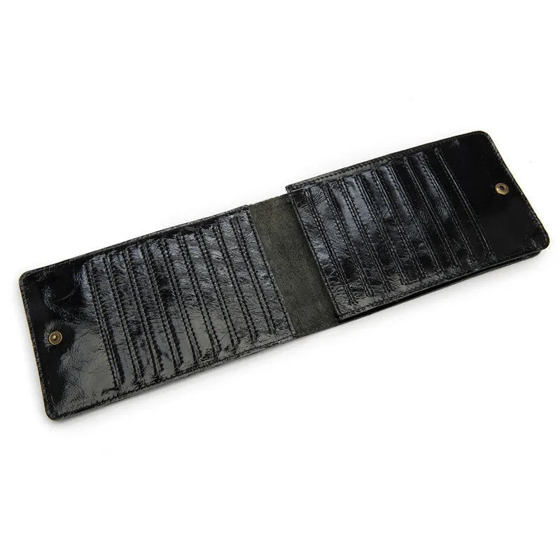 Slim brown cowhide men's wallet open to show 18 card slots and a phone compartment.