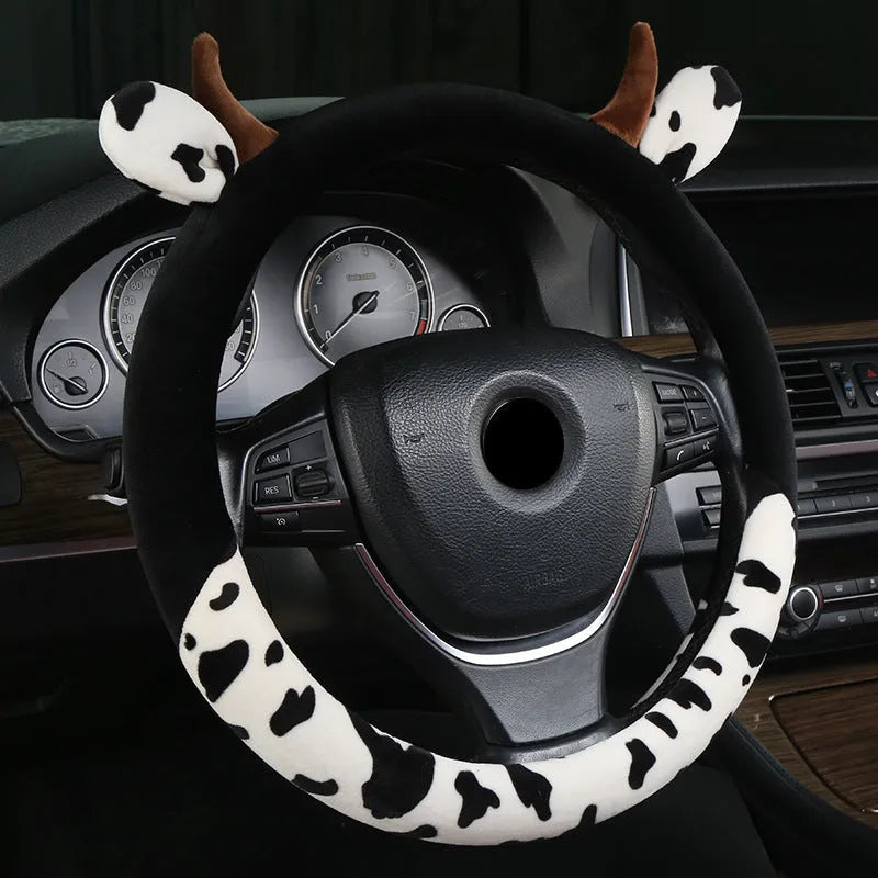 Short plush steering wheel cover in black showing protective grip design