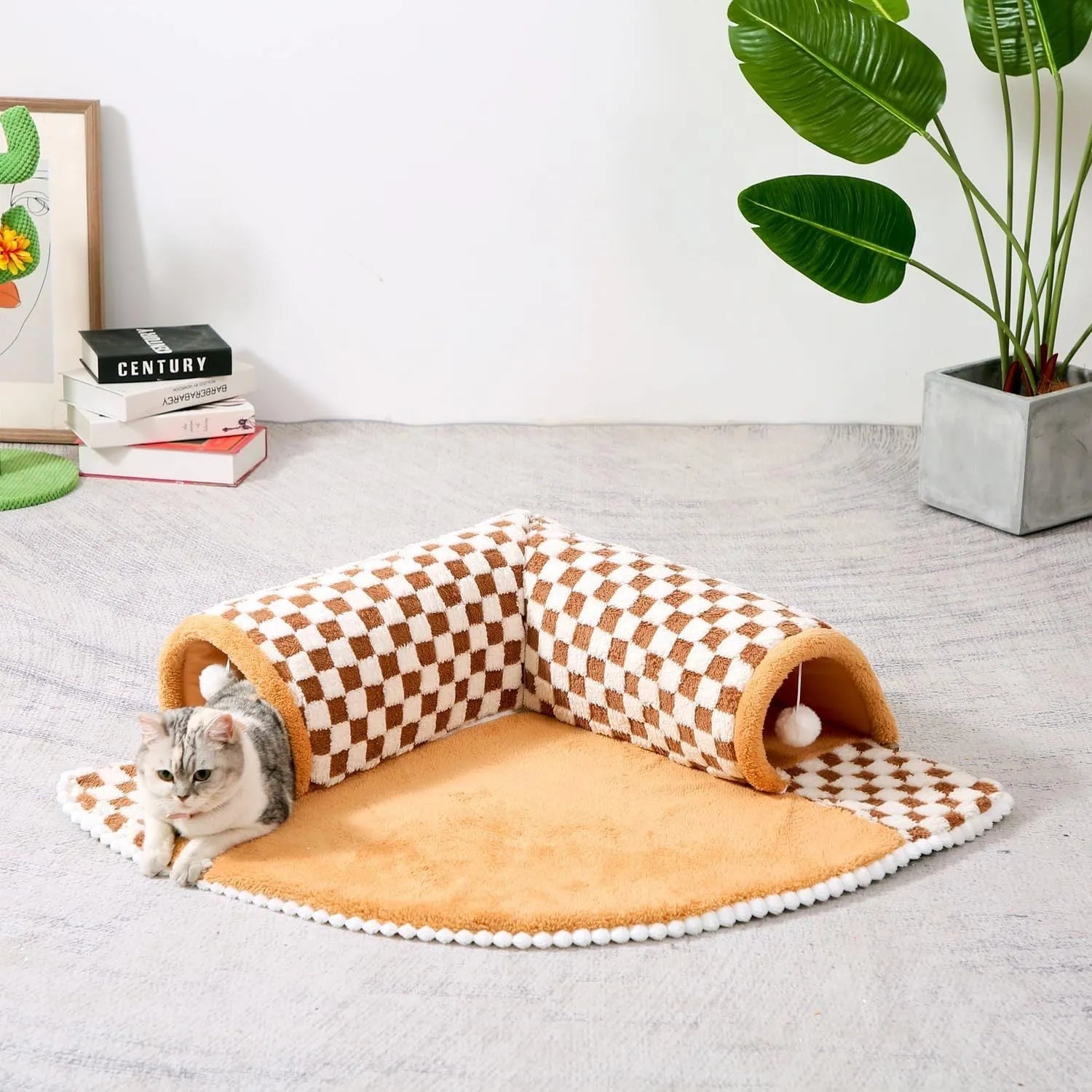 Coffee coloured plush fan-shaped pet bed with integrated tunnel for cats and dogs, showing thick mat and anti-slip base.
