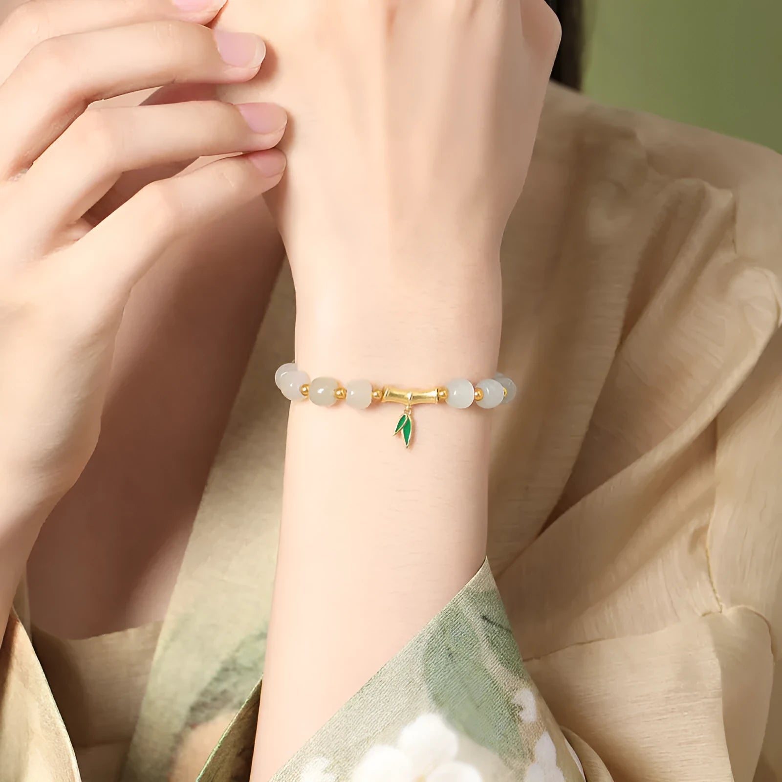 6mm Hetian jade bracelet with bamboo leaf design and 925 silver components