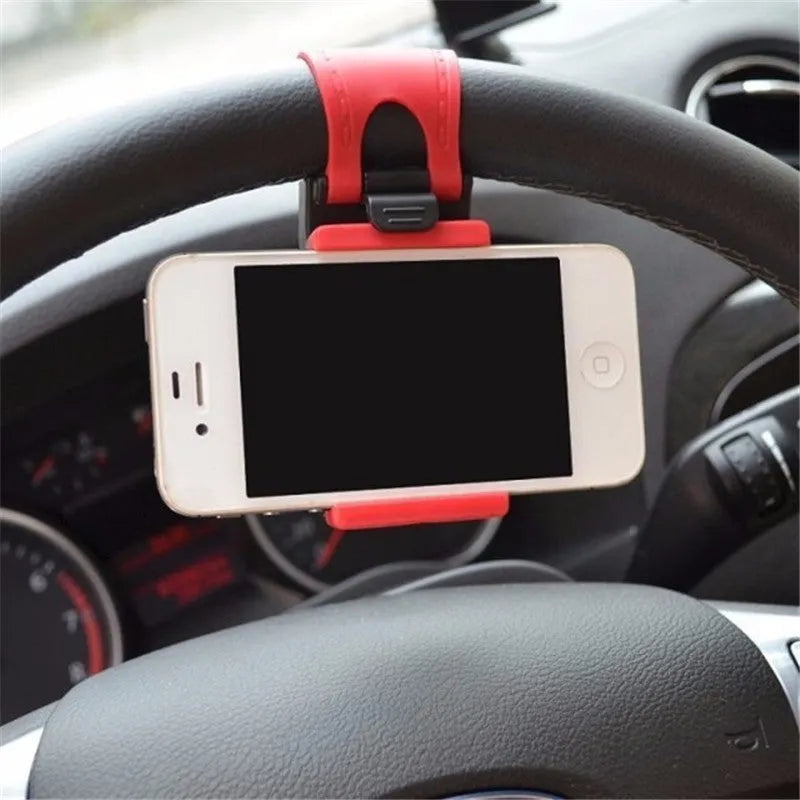 Black universal steering wheel phone mount clip holding a smartphone for hands-free use while driving.