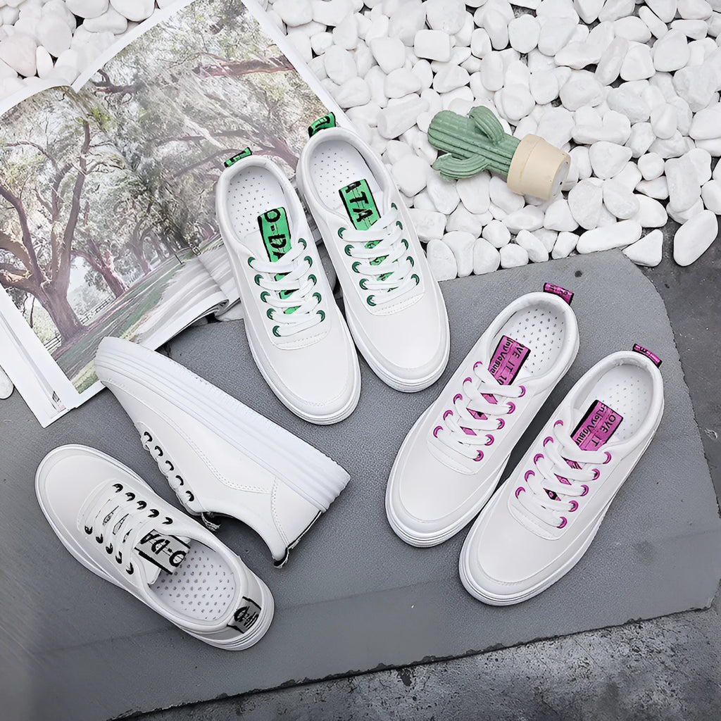 Women's breathable canvas sneaker in microfiber leather with rubber outsole, shown in black, green, or pink