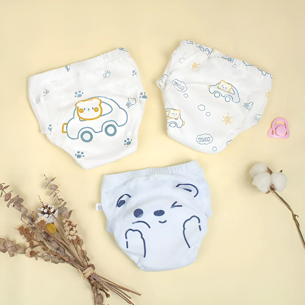 Washable pure cotton cloth diaper training pant with waterproof layer in bear and strawberry rabbit designs, sizes 90-110.