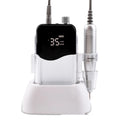 Ail Beauty electric nail grinder with power storage in white plastic body, side view