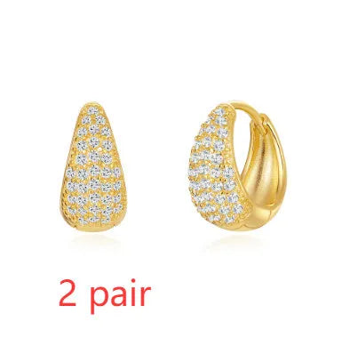 Golden brass diamond earclip earrings with geometric round design on copper base