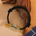 Silver geometric bracelet with Hetian jade peace buckle and black leather cord for card carrying