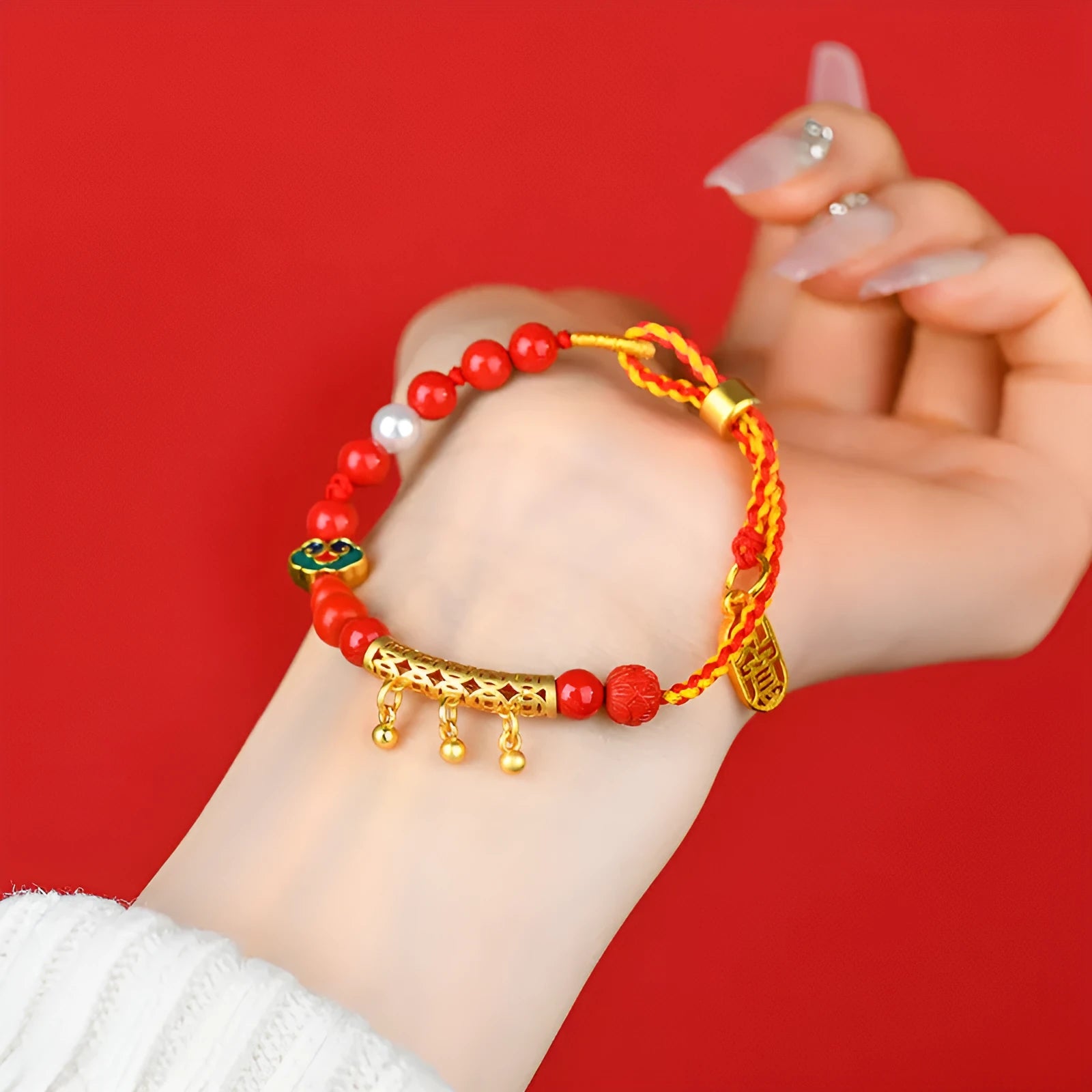 Red cinnabar bead bracelet with hand-woven construction and round geometric elements