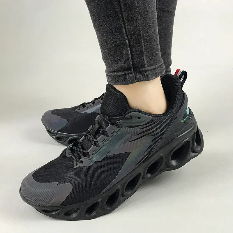 Men's low-top lace-up casual trainers in black with breathable mesh upper and lightweight sole.