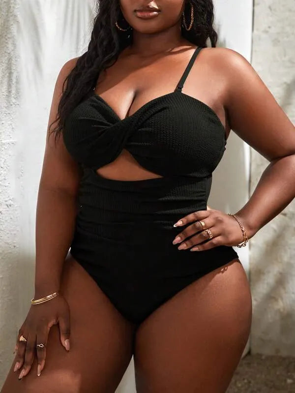 Plus size women's black slimming one-piece swimsuit with triangle sling and sleeveless design, sizes S-5XL