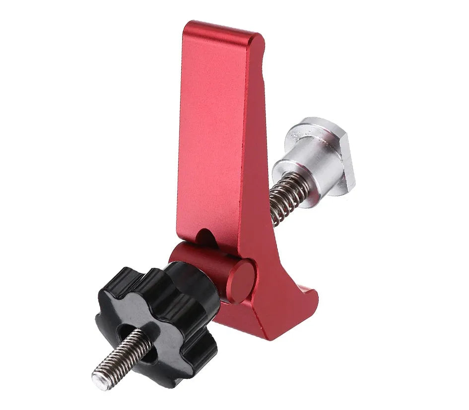 Red aluminium alloy woodworking table block slide holder with flat mouth design on workbench