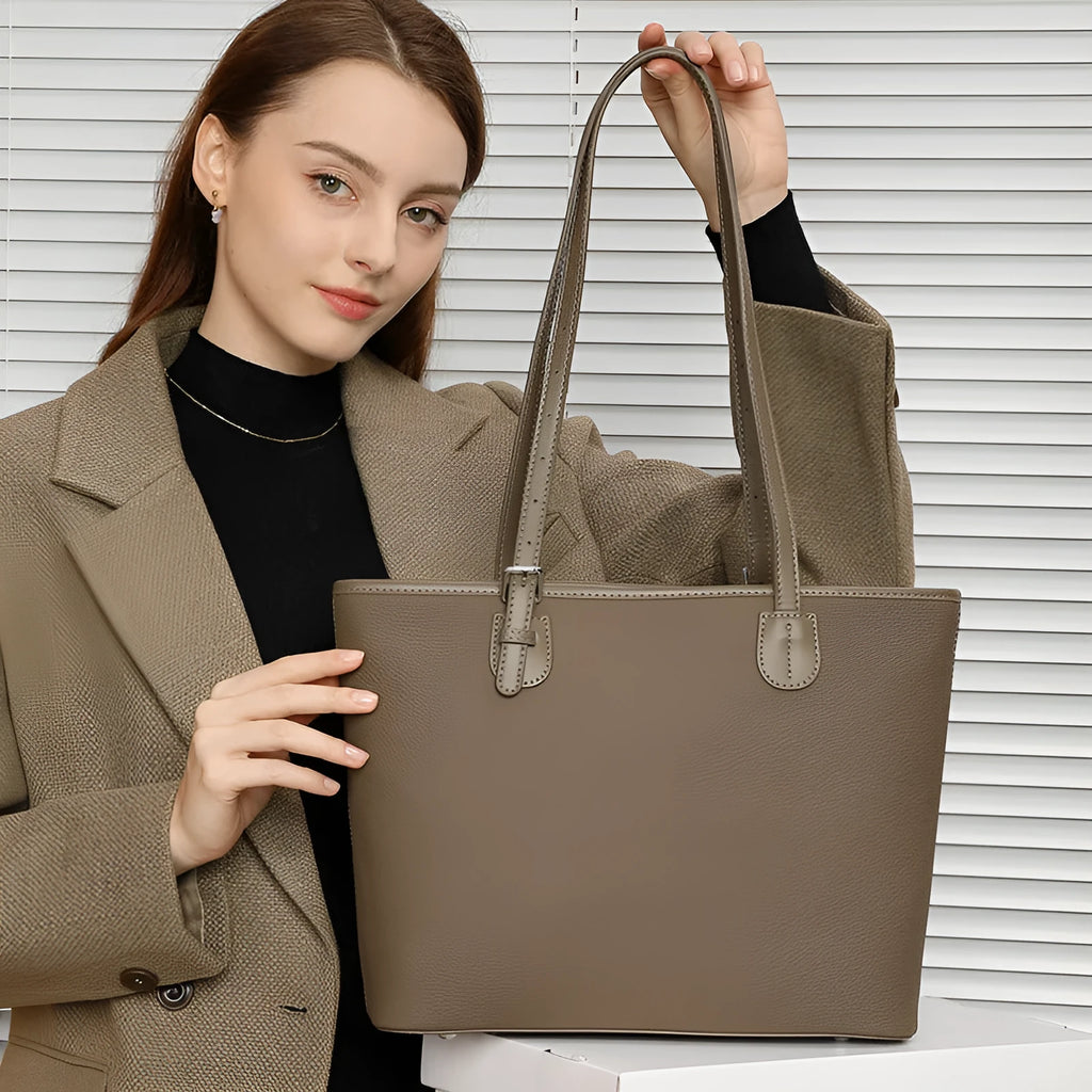 Genuine leather women's tote bag in retro style showing multiple compartments and horizontal suitcase shape