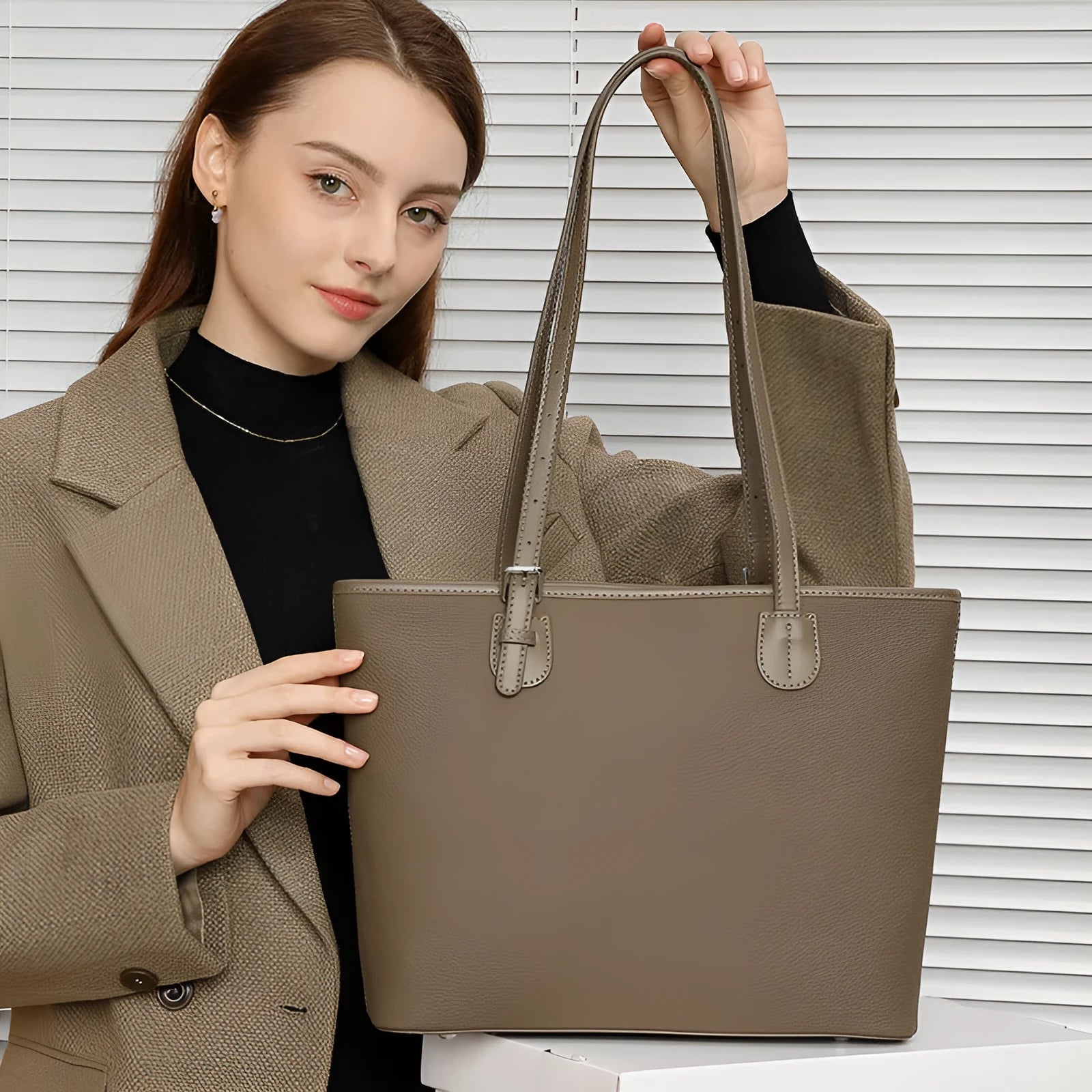 Genuine leather women's tote bag in retro style showing multiple compartments and horizontal suitcase shape