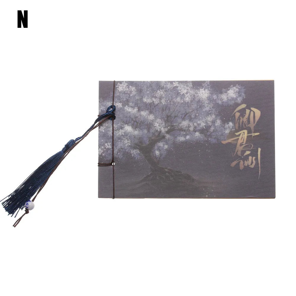 Hand-stitched kraft paper notebook with a tassel bookmark, shown in a natural colour.