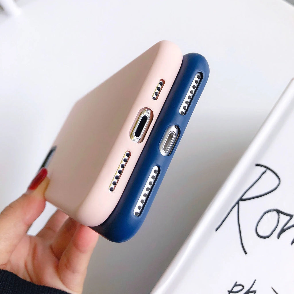 Silicone mobile phone case with macaron cartoon pattern in pink, fitted on an iPhone