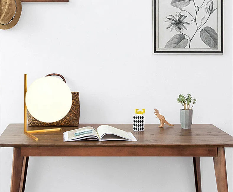 Glass shade LED desk lamp showing three size options and three-tone light colours on a desk.