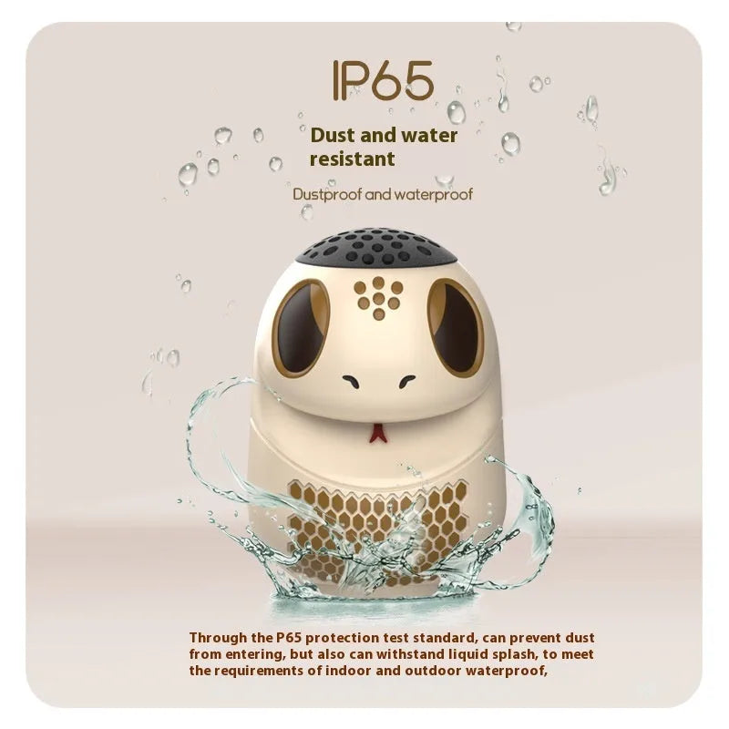 TK900 white cartoon-themed portable Bluetooth speaker with card insertion slot and LED lighting