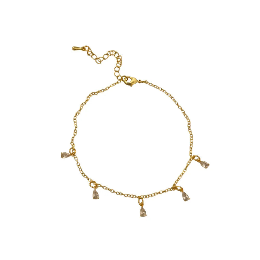 A zircon jewellery set comprising a geometric pendant necklace, stud earrings, and an anklet on a white background.
