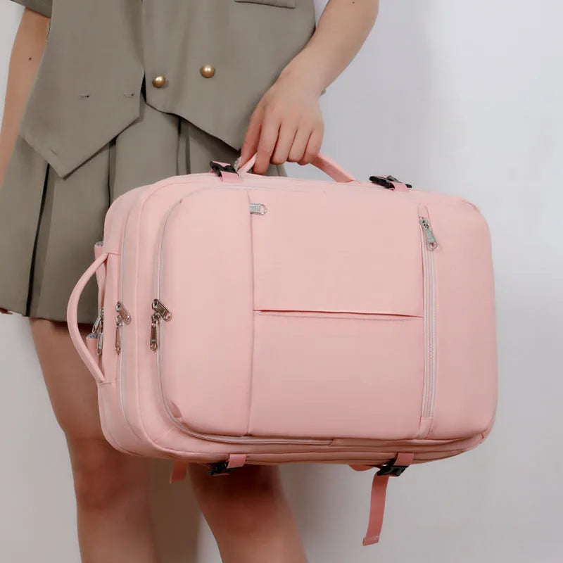 Waterproof Oxford cloth backpack with multiple pockets holding a 15.6 inch laptop