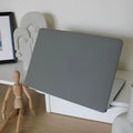 Quicksand Cobalt Gray protective shell for Apple MacBook, simple sticker design, front view