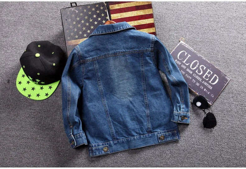 Children's dark blue cotton ripped denim jacket with hood, front view, single breasted style