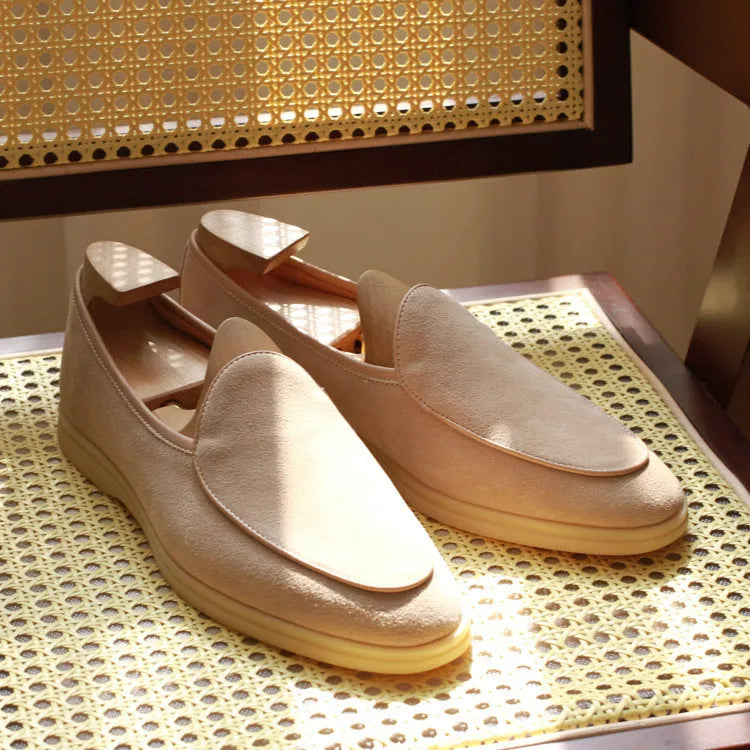 Men's brown genuine leather handmade loafers flat shoes on a white background.