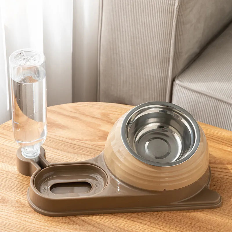 Brown elevated cat bowl with attached water bottle dispenser on a white background