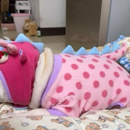 Pink polyester winter coat for small dog with optional hat on a French bulldog model