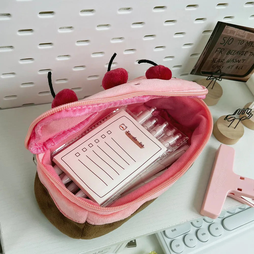 Cherry Cake coloured plush velvet pencil bag with a zip closure.