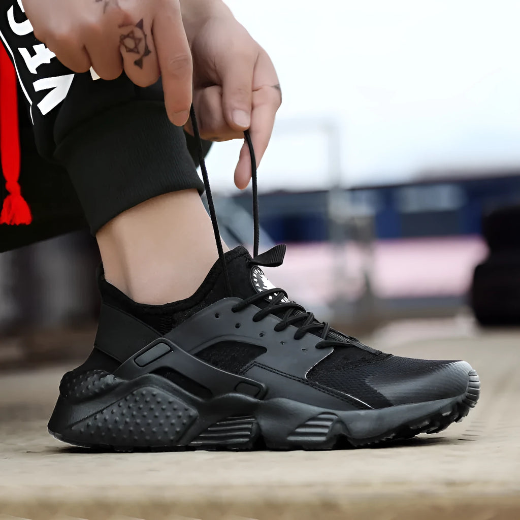 Women's lightweight mesh sports shoes with flat heel and round toe in black and white colour
