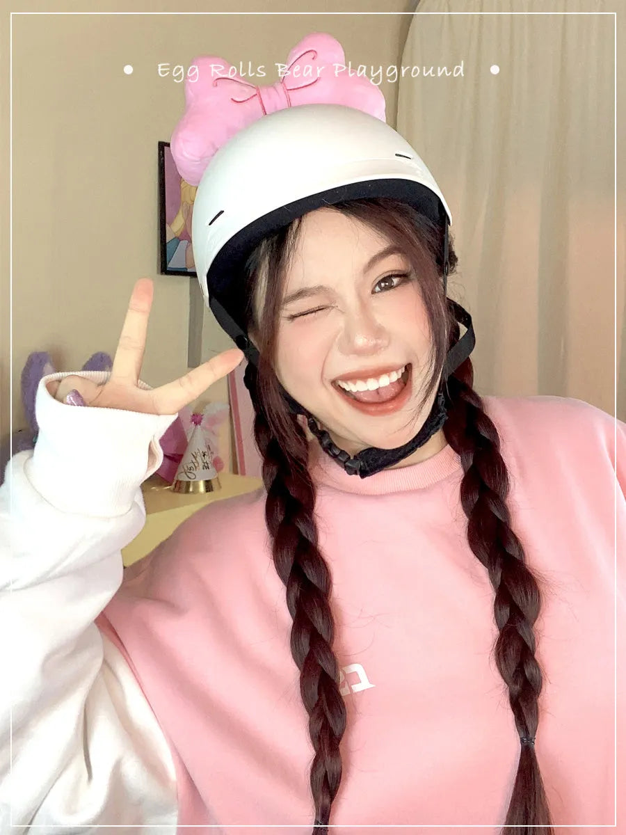 Soft plush bow helmet decoration in red, pink, or rose pink for motorcycle or ski helmet customisation.