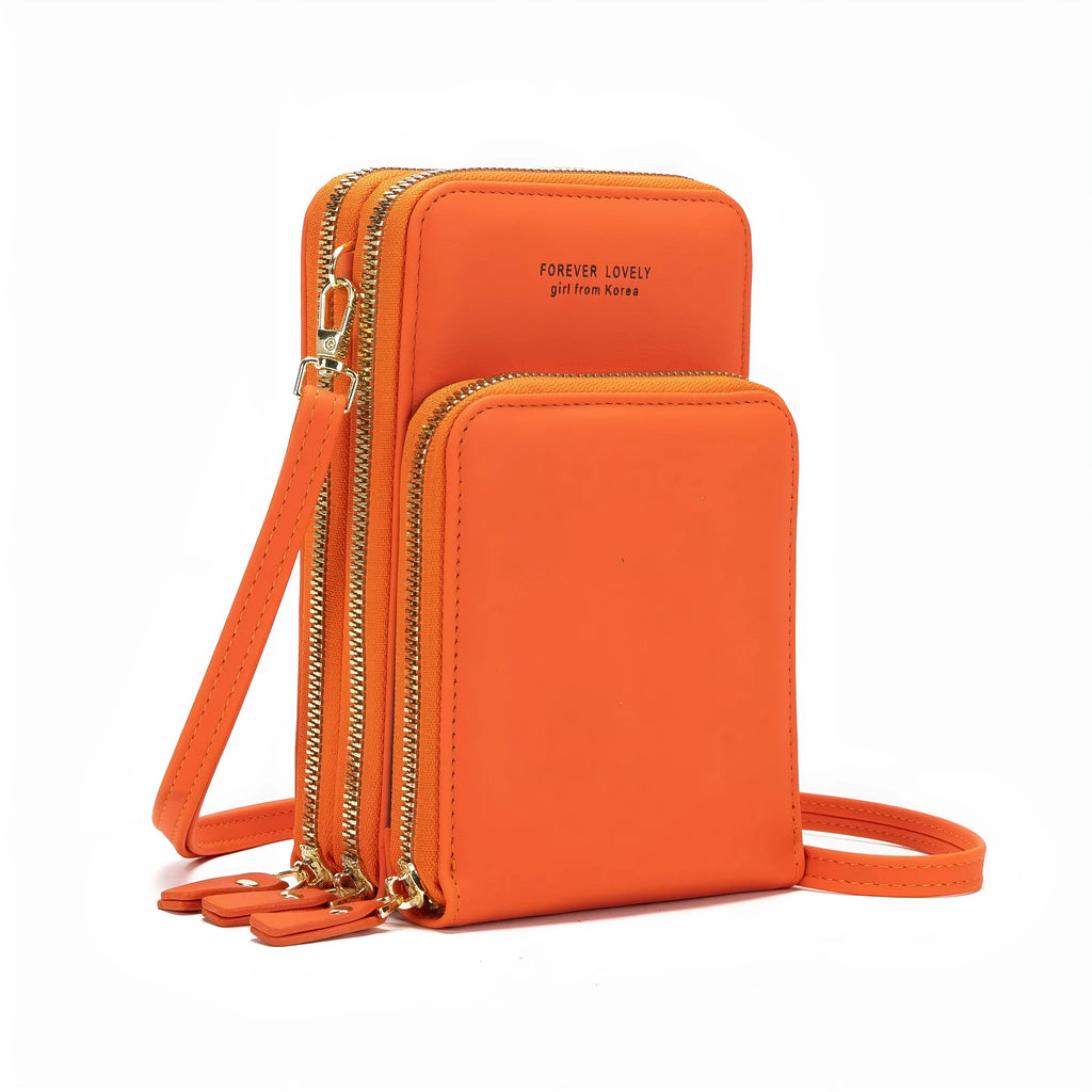 Green crossbody bag with tri-fold pockets and zipper closure on white background