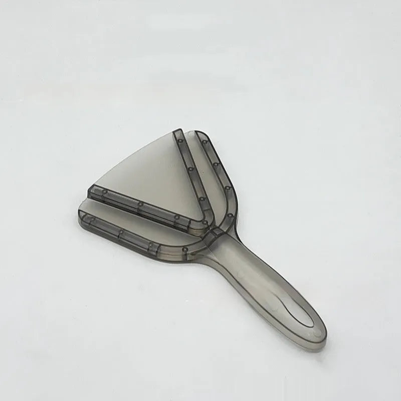 Adjustable telescopic bottle and can opener with a non-slip red handle on a kitchen counter.