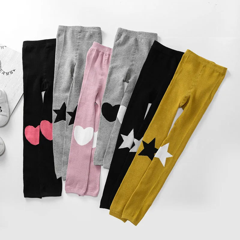 Girl's cotton leggings with five-pointed star and heart patterns in solid colour design