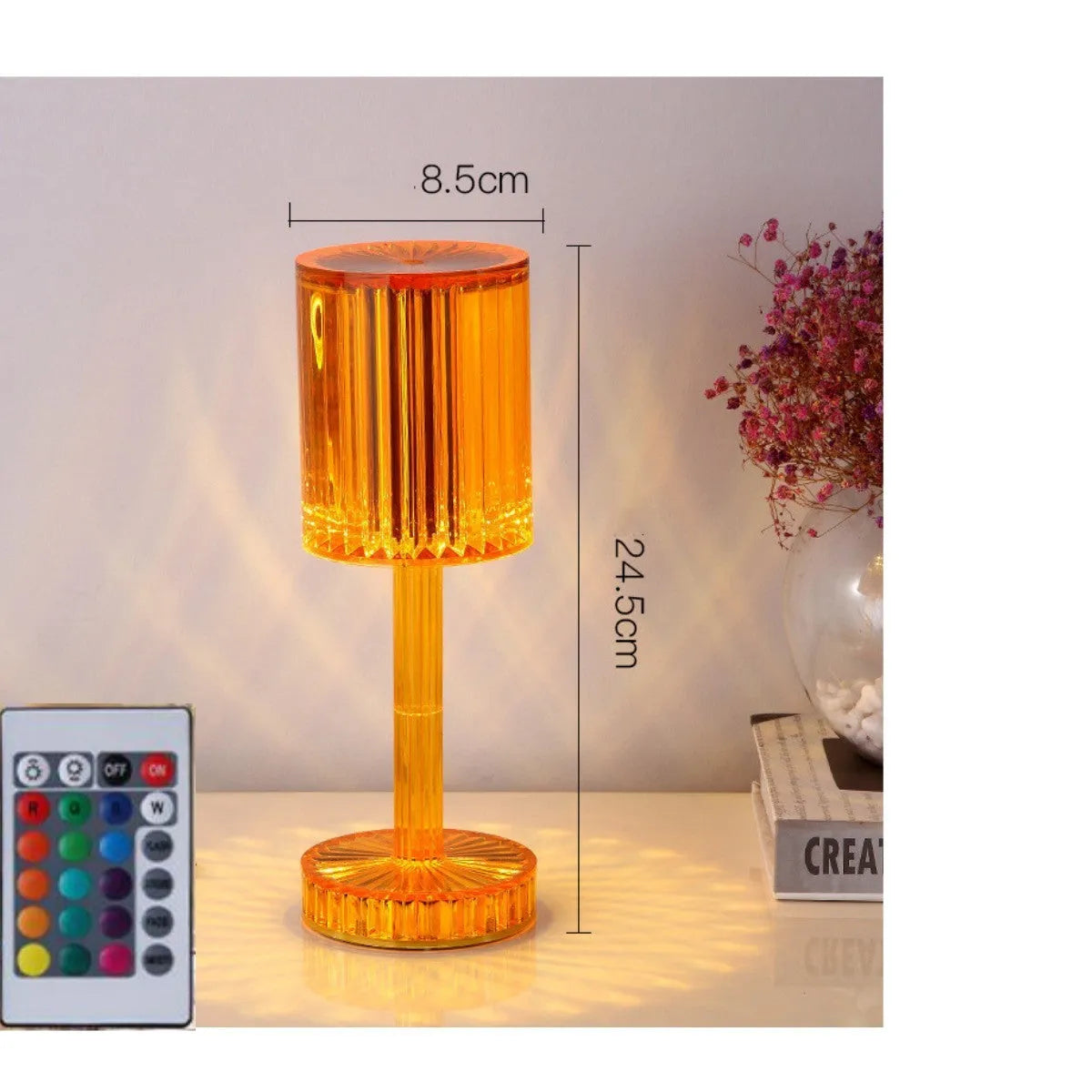 Modern crystal table lamp with a diamond-faceted shade on a metal stand, showing amber colour option.