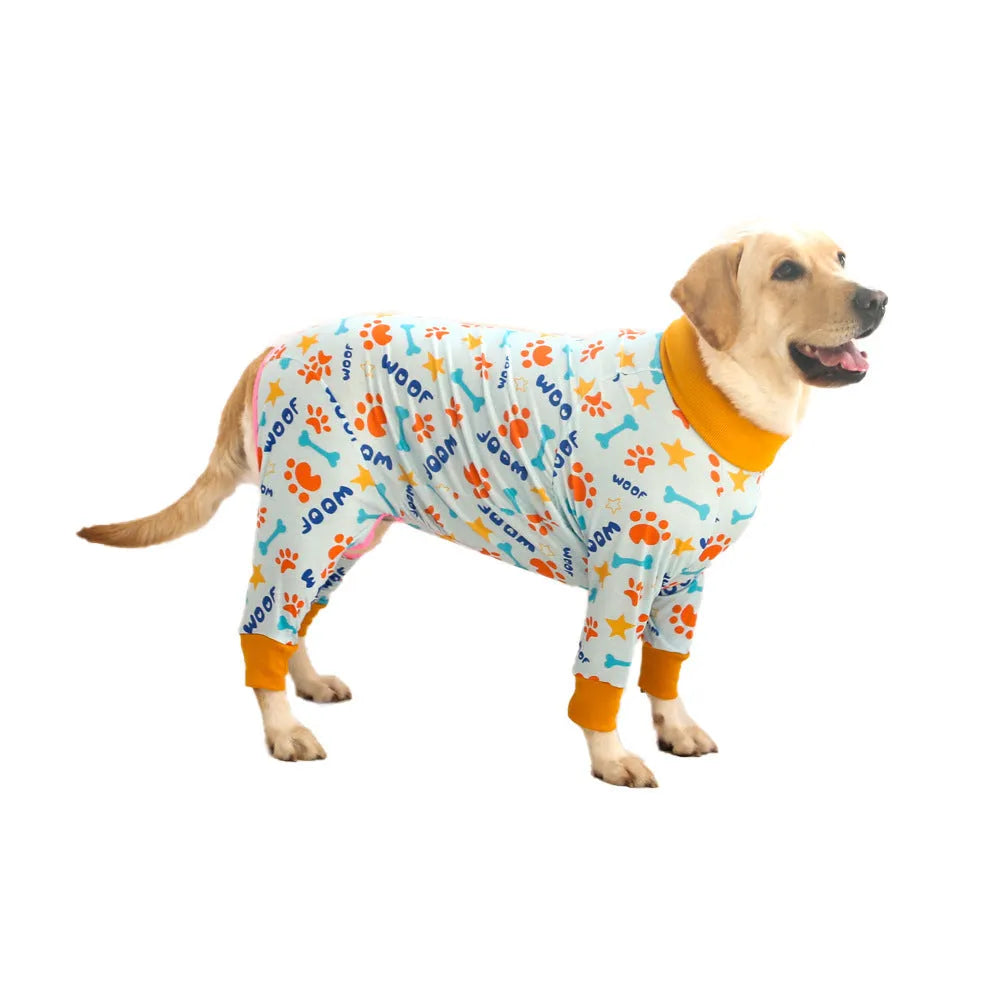 Cotton four-legged dog jumpsuit with colourful print design, shown on a small dog.